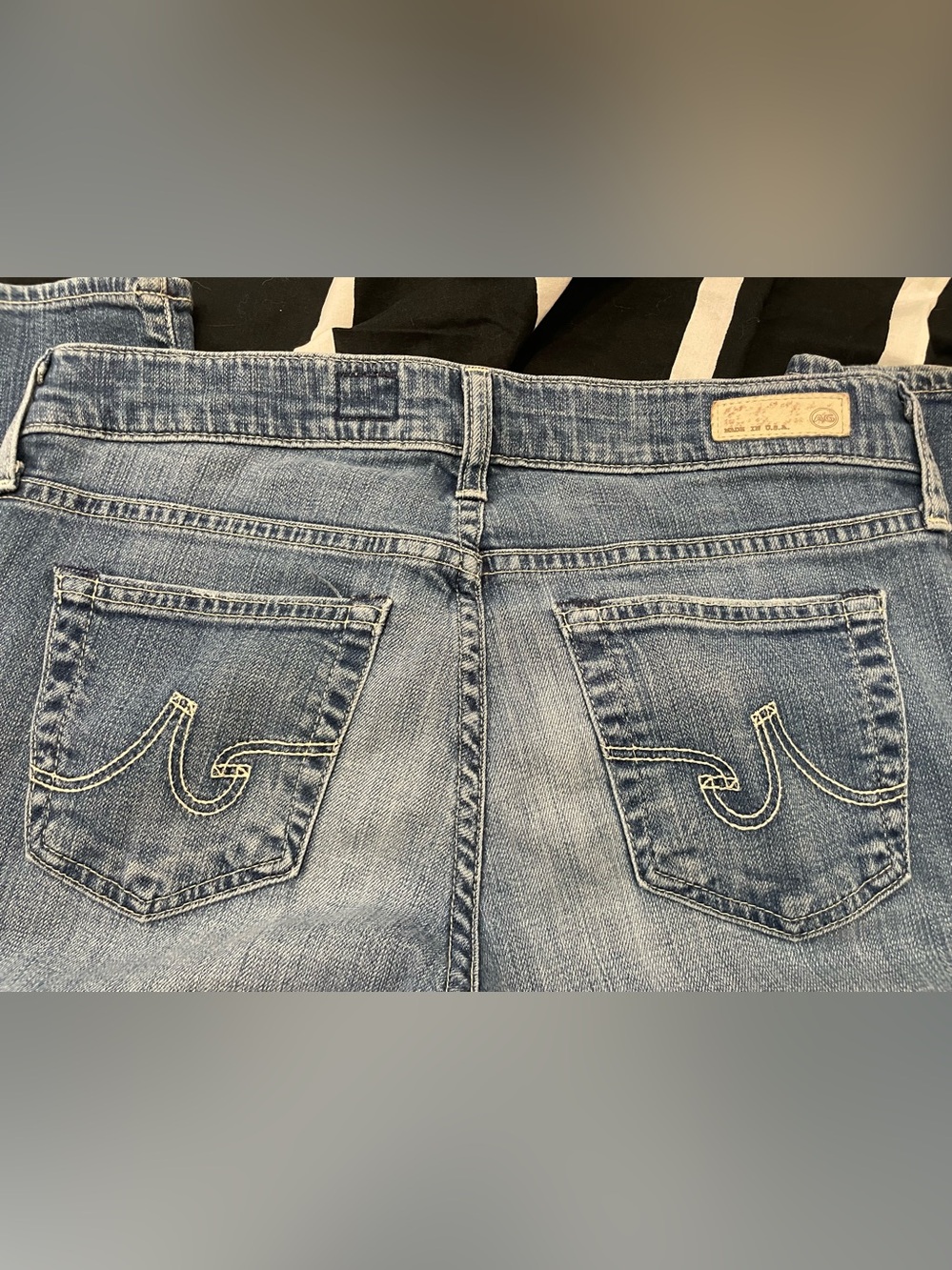 AG Adriano Goldschmied Light Blue Bootcut Jeans with Signature Pocket Stitch